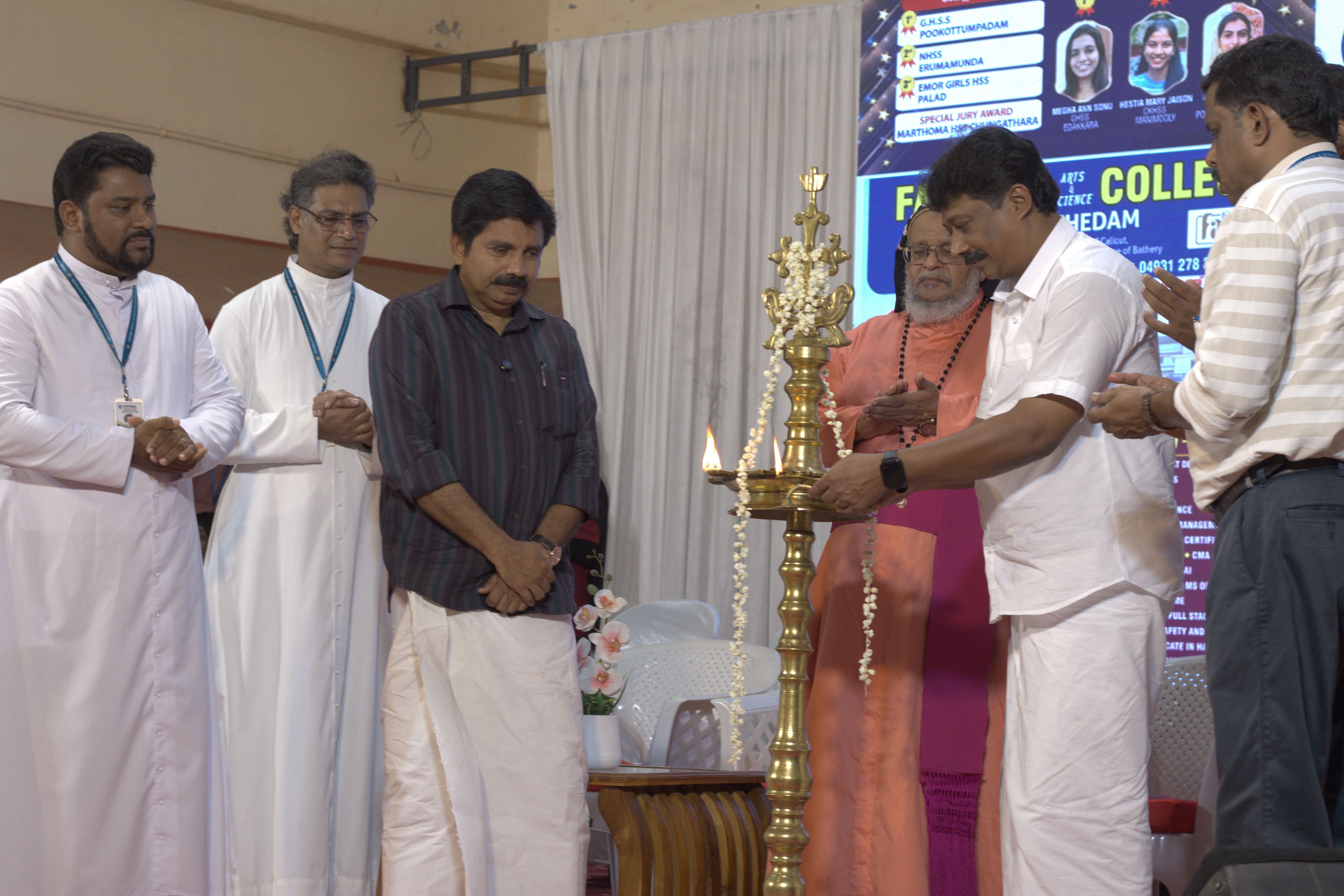 Women students in lab coats performing chemistry experiments with glassware in a college laboratory
